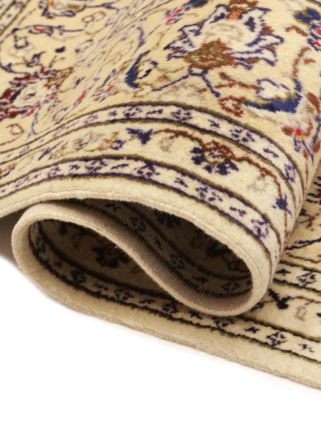 Hand-knotted Keshan rug from the Middle East in beige with intricate floral motifs