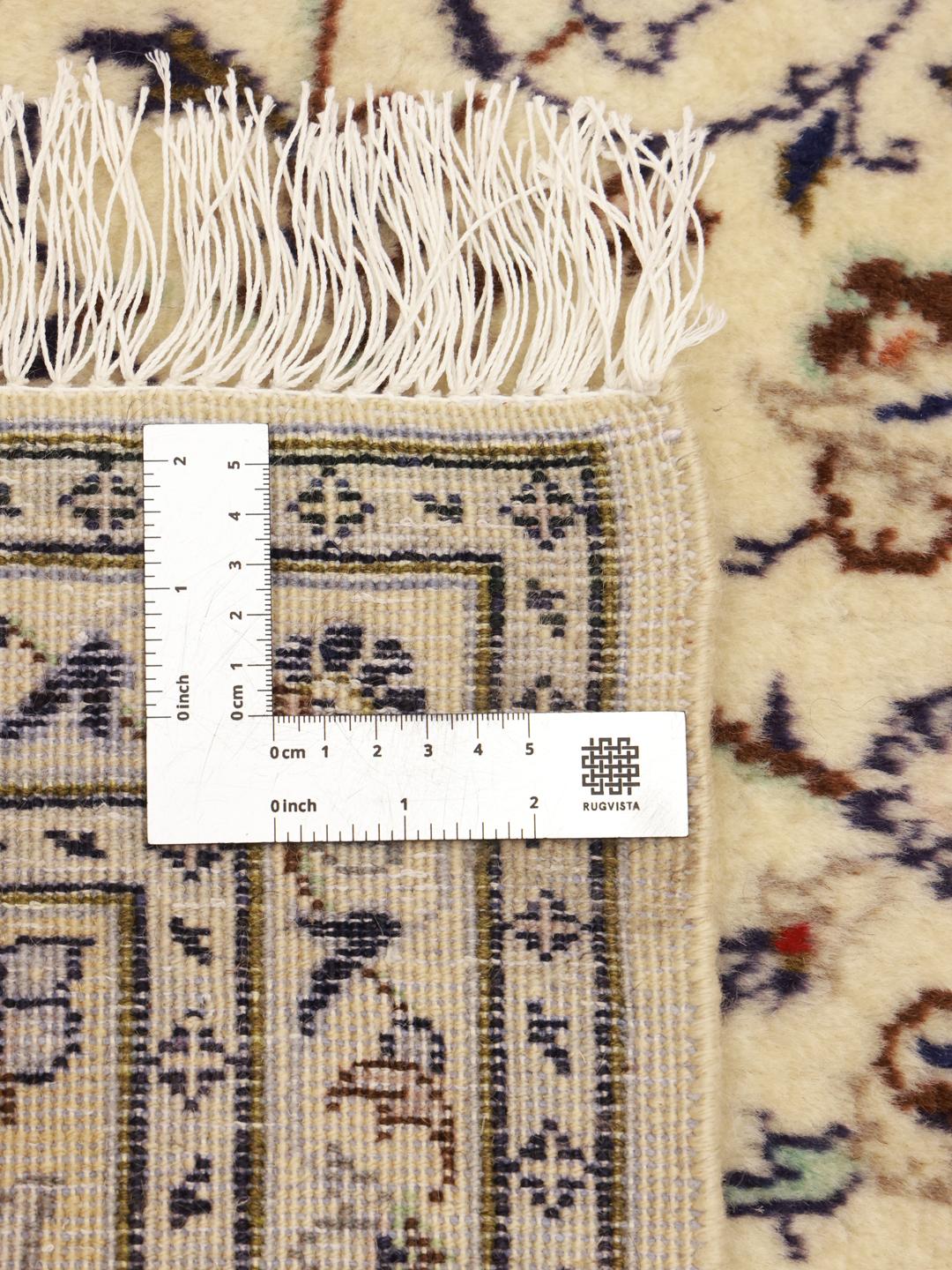 Hand-knotted Keshan rug from the Middle East in beige with intricate floral motifs