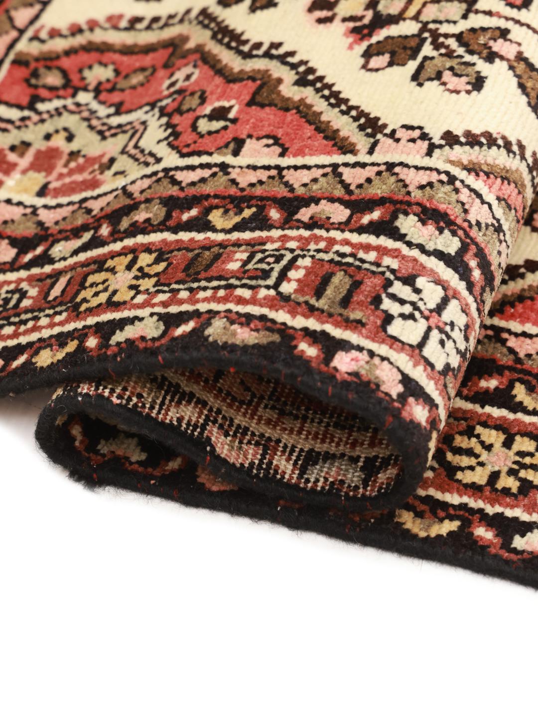 Hand-knotted Middle Eastern Hamadan rug with a red and beige floral medallion