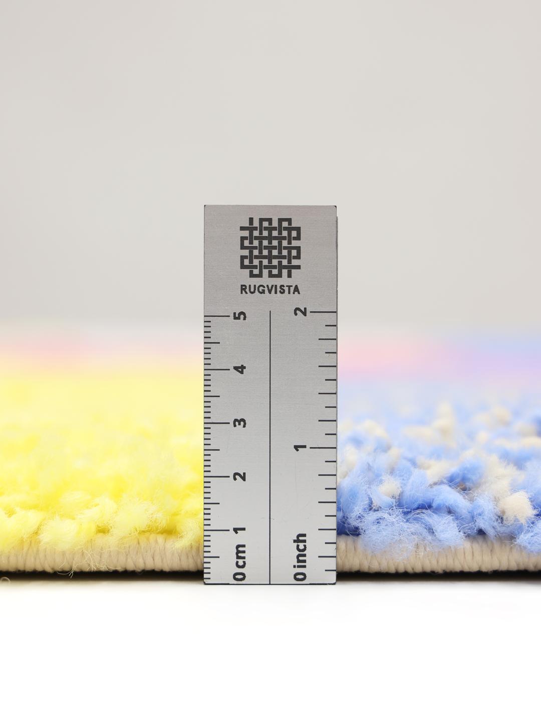 Multicolor vloerkleed met geometrisch patroon en franjes