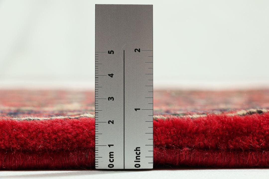 Hand-knotted Hosseinabad runner with a geometric pattern in red and dark blue