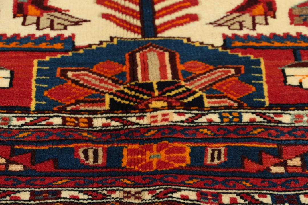 Hand-knotted Hamadan rug from the Middle East featuring a vibrant red and blue colour palette