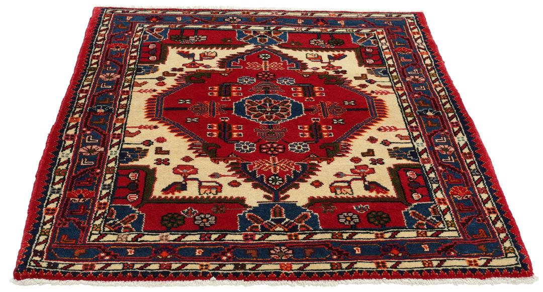 Hand-knotted Toiserkan rug from the Middle East in vibrant red and blue tones