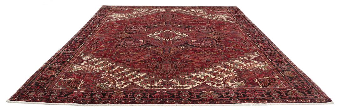 Handgeknoopt Heriz tapijt uit het Midden-Oosten met een gedurfd rood geometrisch patroon
