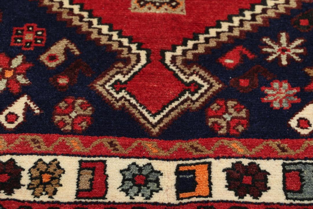 Hand-knotted Afshar rug from the Middle East in red and blue tones