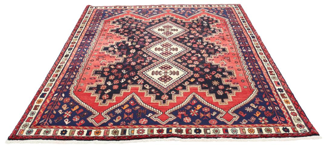 Hand-knotted Afshar rug from the Middle East in red and blue tones