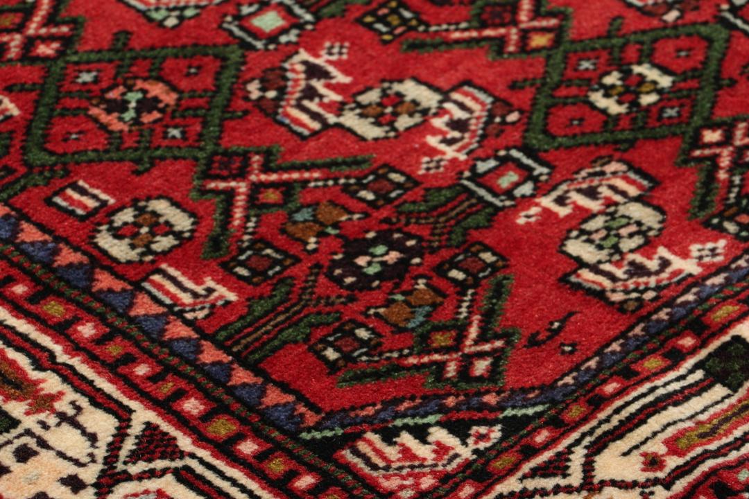 Hand-knotted red runner from the Hamadan region