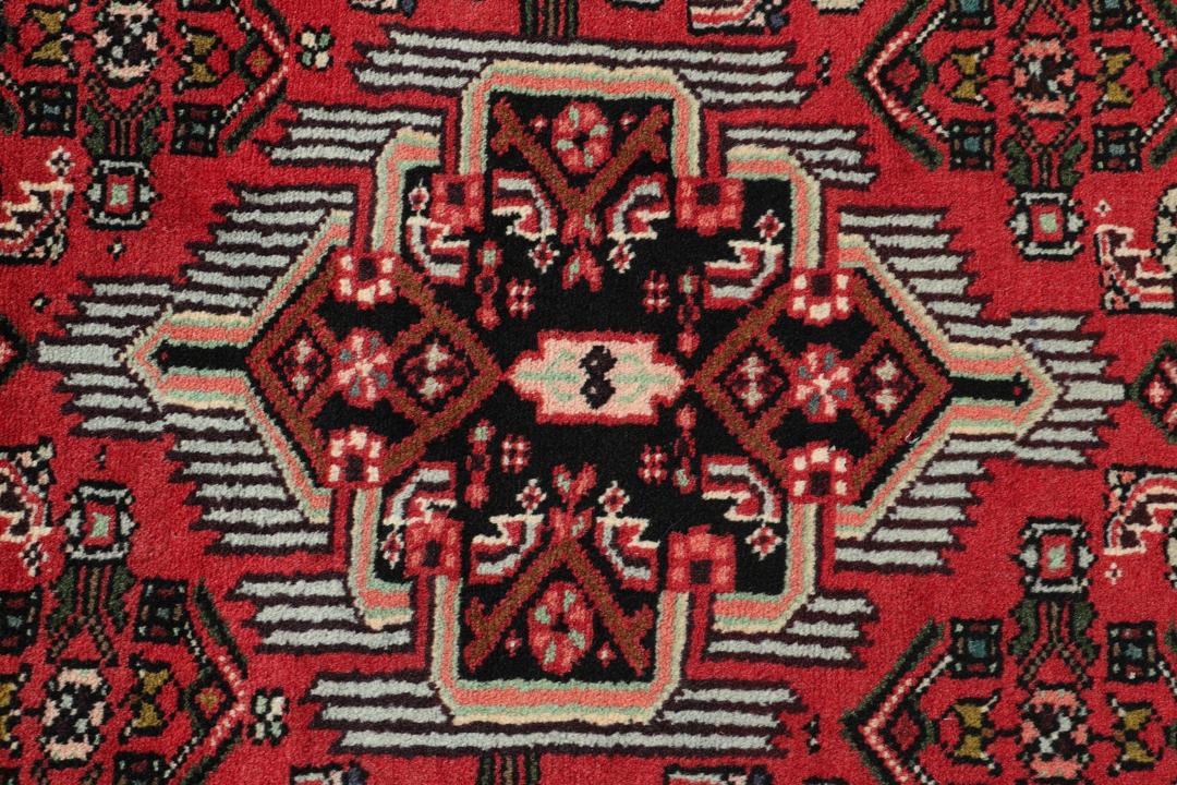 Hand-knotted red runner from the Hamadan region