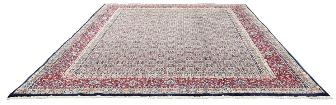 Hand-knotted Moud rug from the Middle East in shades of red and blue