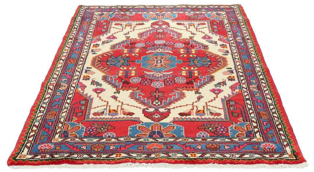 Hand-knotted Hamadan rug featuring a red field with blue and cream geometric motifs