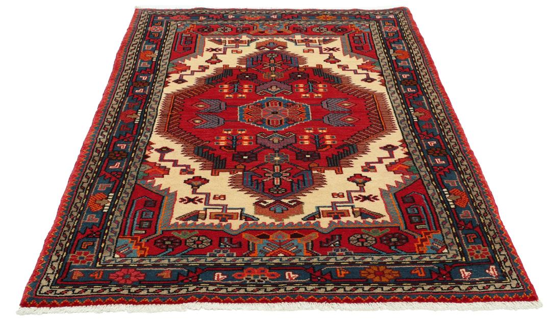 A hand-knotted Hamadan rug from the Middle East featuring a vibrant red and blue geometric design.