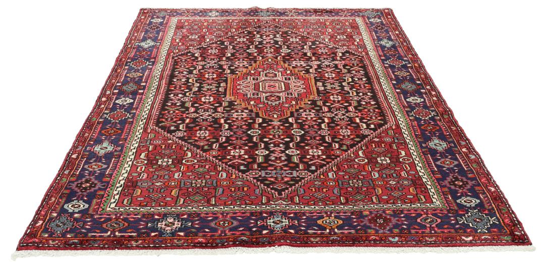 Hand-knotted Hamadan rug from the Middle East in dark-red and dark-blue tones.