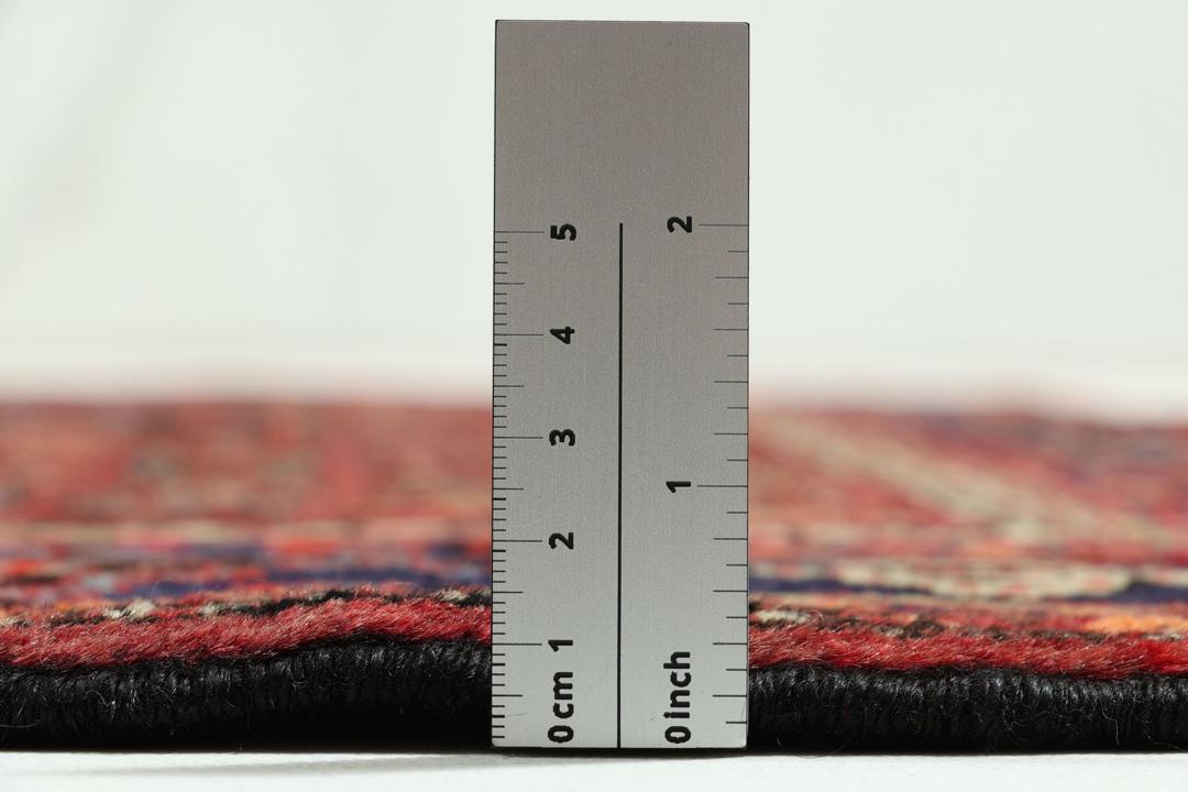 Hand-knotted Hamadan rug from the Middle East in dark-red and dark-blue tones.
