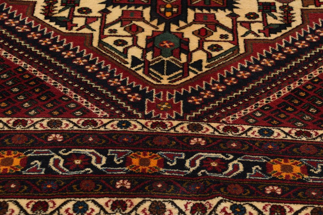 Hand-knotted Afshar Shahre Babak rug from the Middle East in dark-red