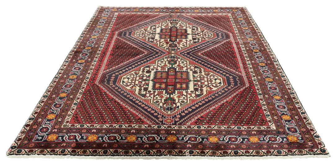 Hand-knotted Afshar Shahre Babak rug from the Middle East in dark-red