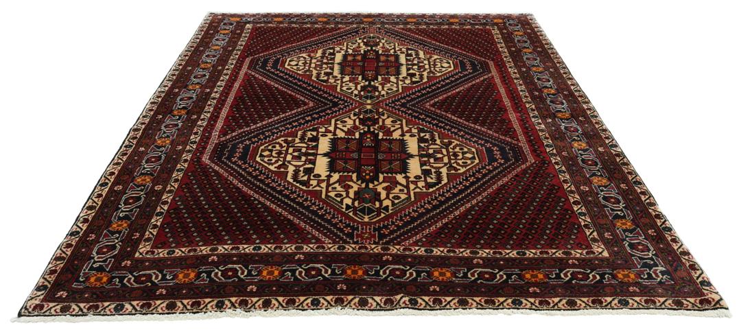 Hand-knotted Afshar Shahre Babak rug from the Middle East in dark-red