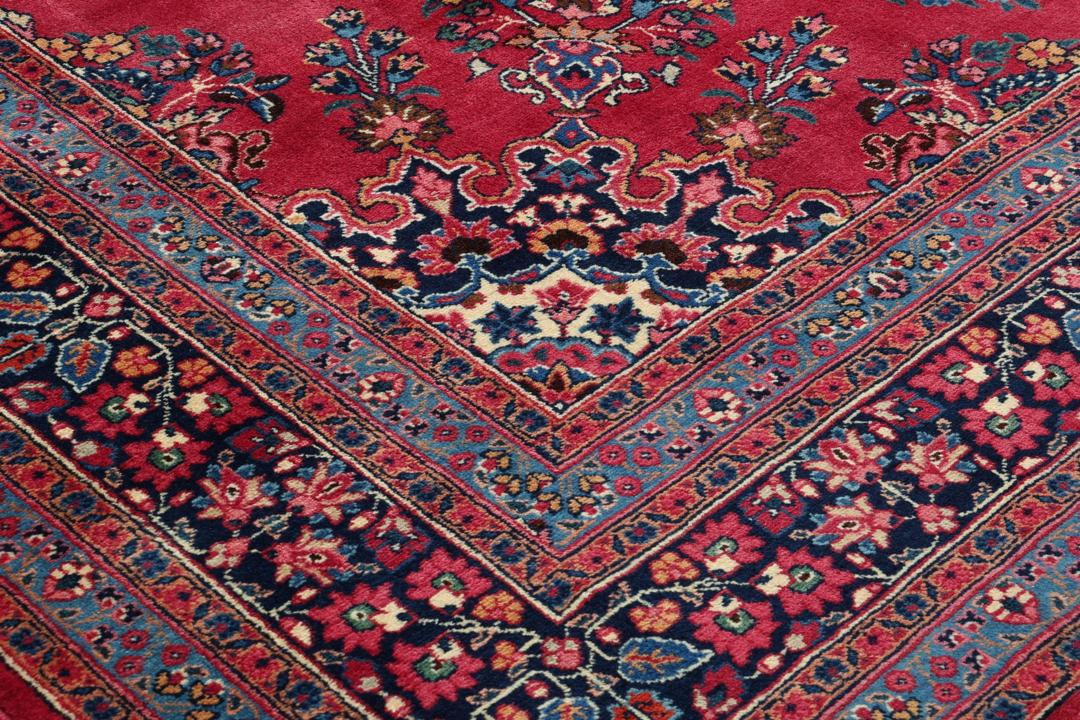 Tapis Mashad rouge noué à la main originaire du Moyen-Orient