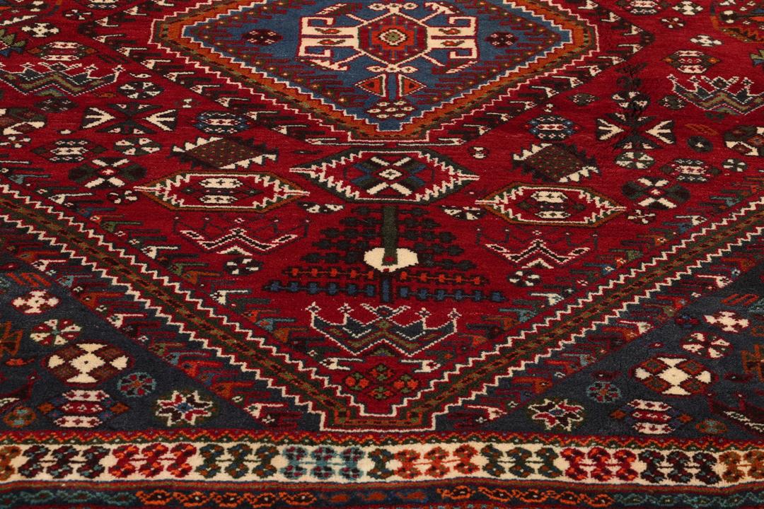 Handgeknoopt Shiraz-tapijt met traditionele tribale patronen uit het Midden-Oosten in rood en blauw