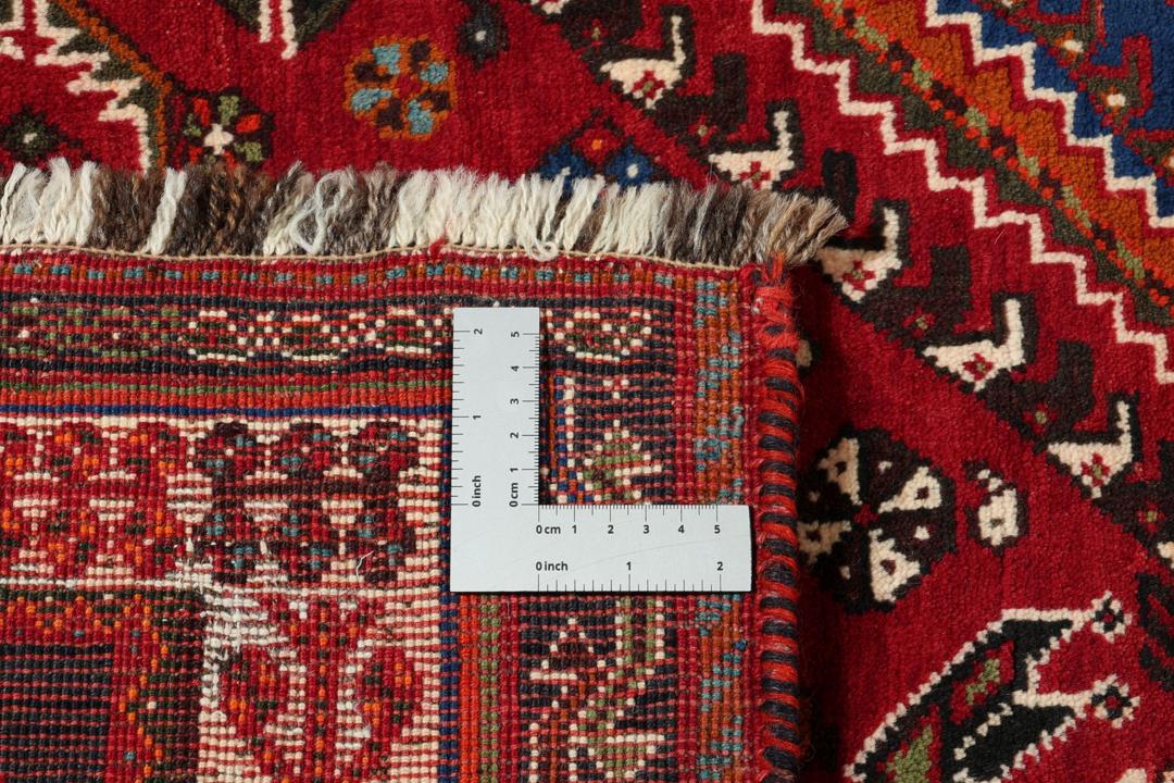 Handgeknoopt Shiraz-tapijt met traditionele tribale patronen uit het Midden-Oosten in rood en blauw