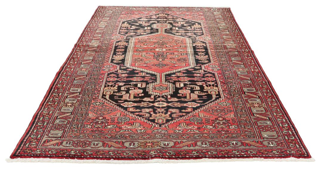 Hand-knotted Hamadan rug from the Middle East in deep dark-red and black tones.