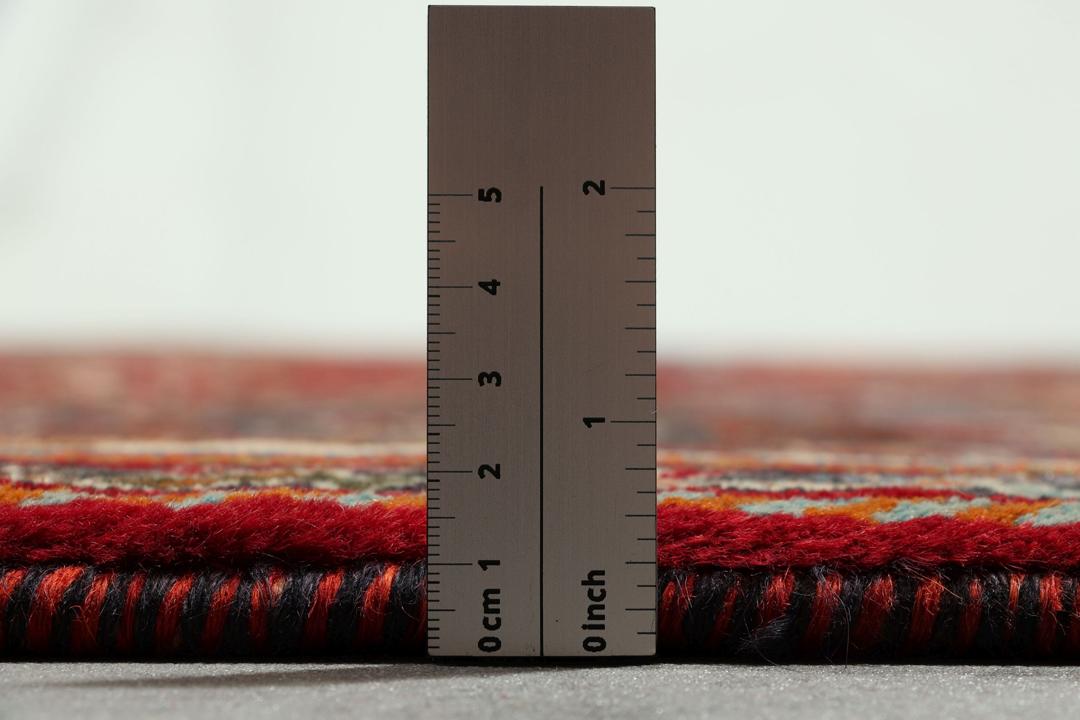 Handgeknoopt Shiraz-tapijt met traditionele tribale patronen uit het Midden-Oosten in rood en blauw