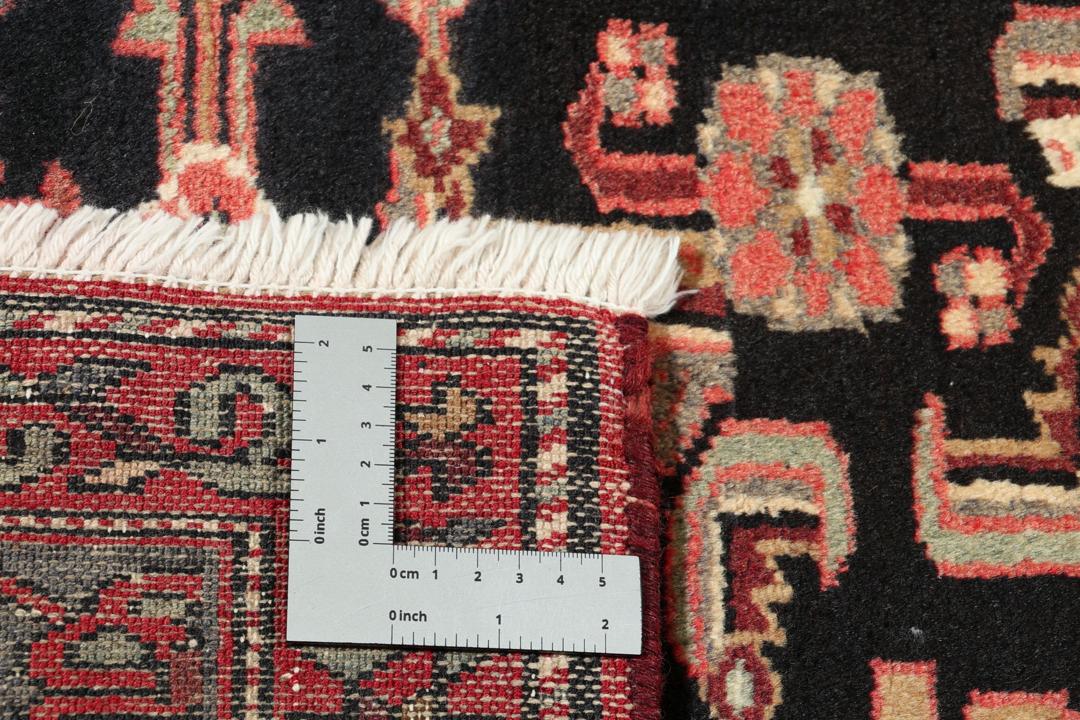 Hand-knotted Hamadan rug from the Middle East in deep dark-red and black tones.