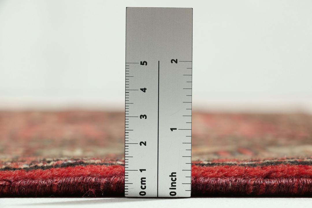 Hand-knotted Hamadan rug from the Middle East in deep dark-red and black tones.