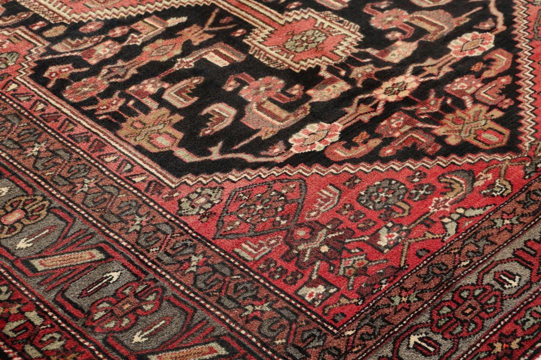 Hand-knotted Hamadan rug from the Middle East in deep dark-red and black tones.