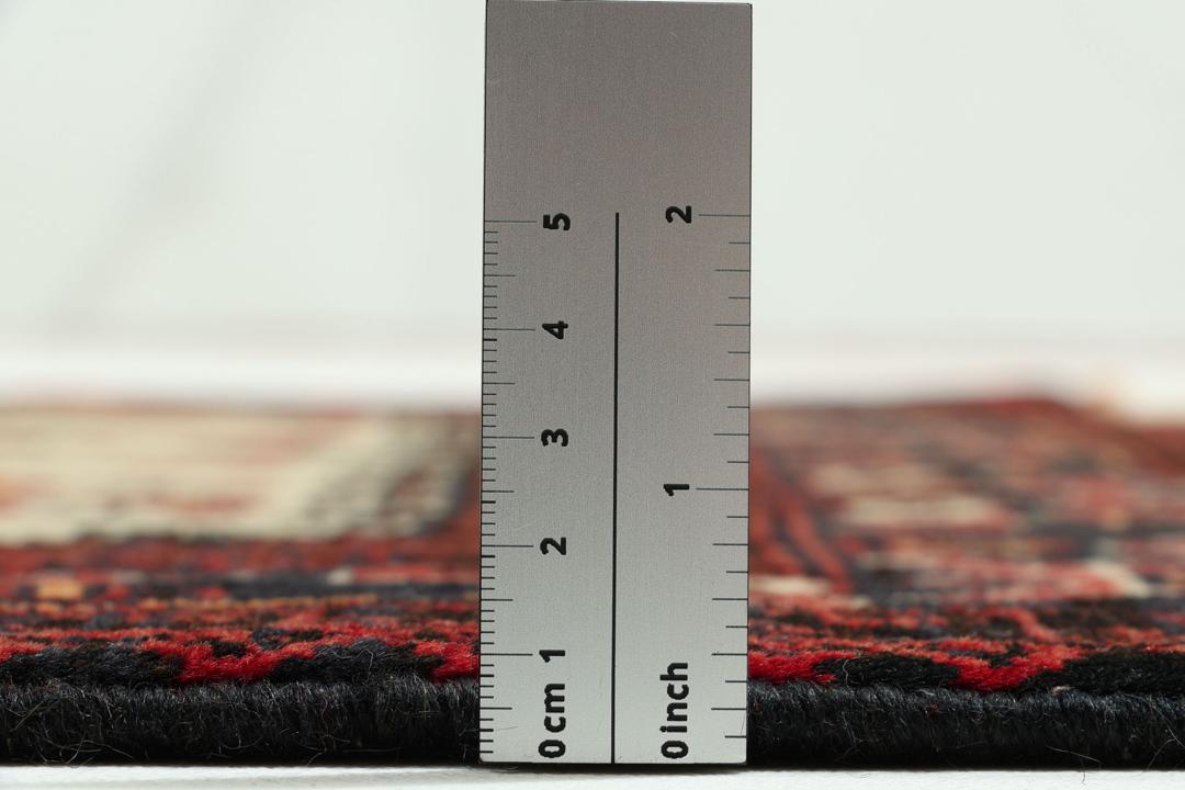 Håndknyttet Baluch-tæppe fra Mellemøsten med et rødt og beige mønster
