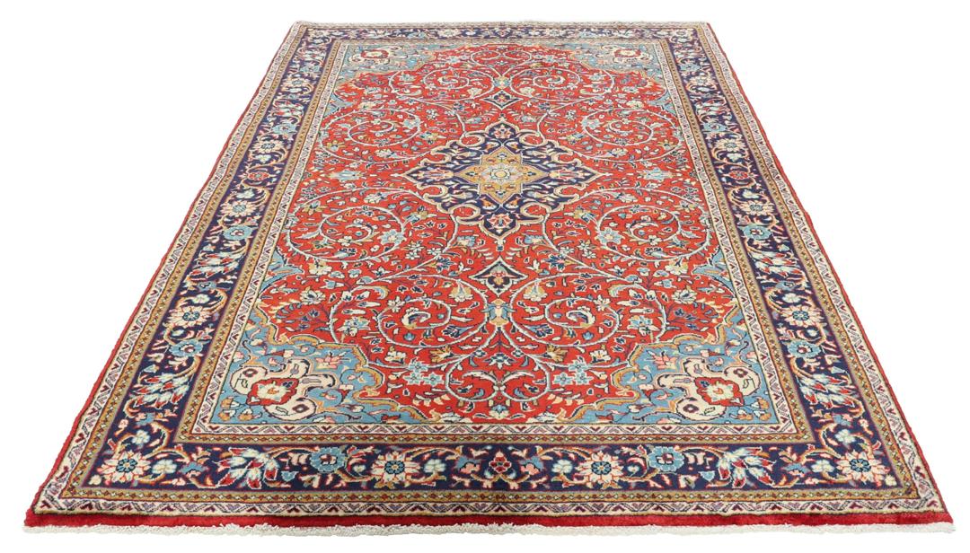 Hand-knotted Sarough rug with floral pattern in red and blue