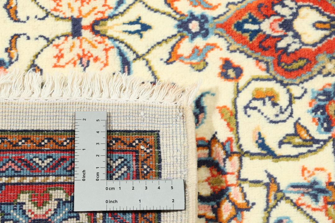 Hand-knotted Sarough wool rug with floral medallion in red and beige