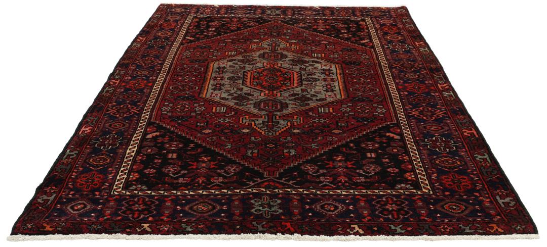 Hand-knotted Hamadan rug from the Middle East in dark red and black tones
