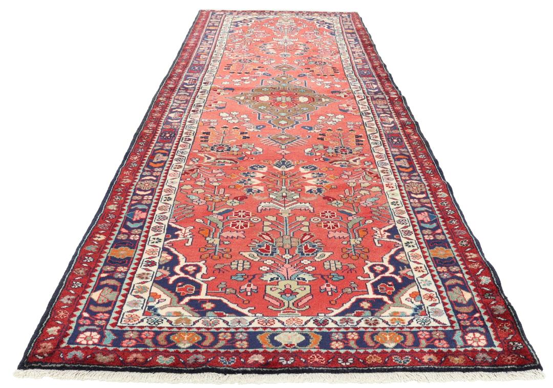 Hand-knotted Hamadan runner rug in red with traditional Middle Eastern geometric patterns.