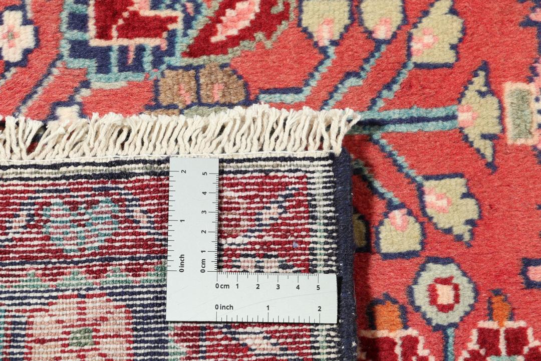 Hand-knotted Hamadan runner rug in red with traditional Middle Eastern geometric patterns.