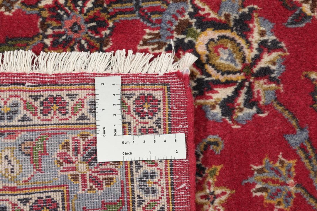 Hand-knotted Keshan rug from the Middle East in deep red tones