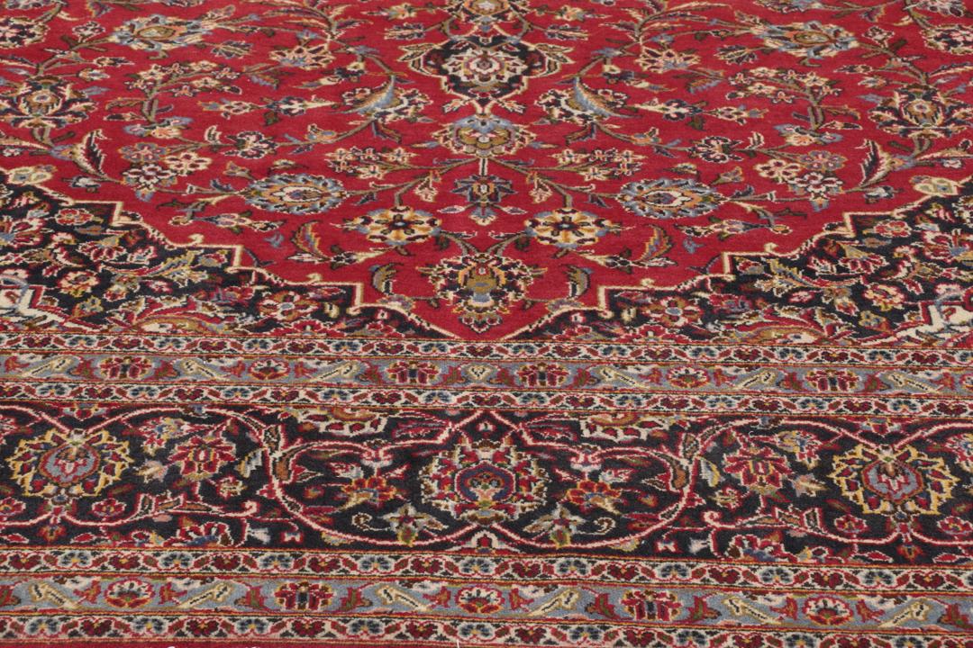 Hand-knotted Keshan rug from the Middle East in deep red tones