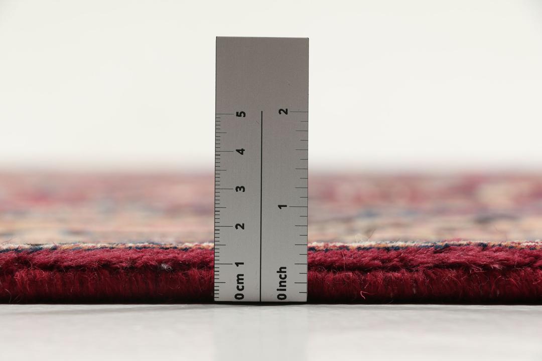 Håndknyttet Mashad-tæppe fra Mellemøsten i mørkerøde nuancer med blomstermønstre