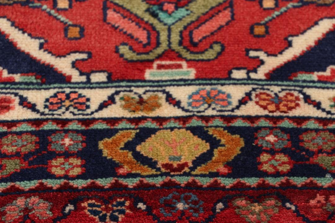 Hand-knotted red Hamadan runner with traditional floral motifs