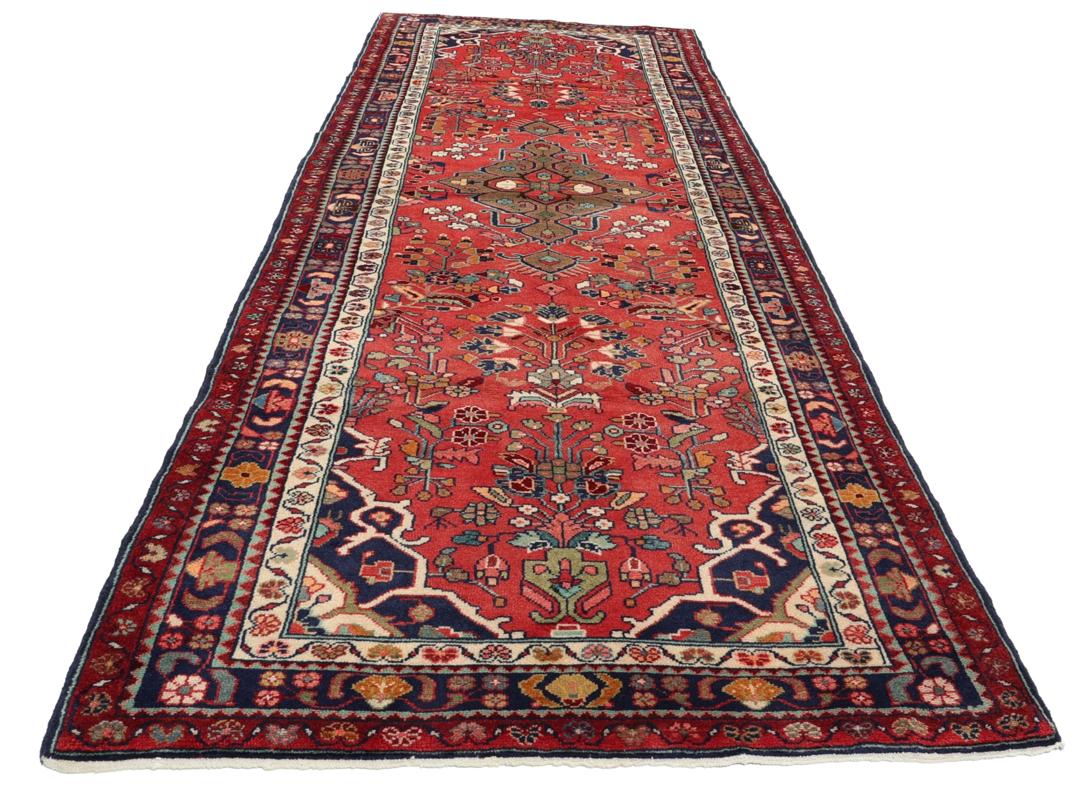 Hand-knotted red Hamadan runner with traditional floral motifs