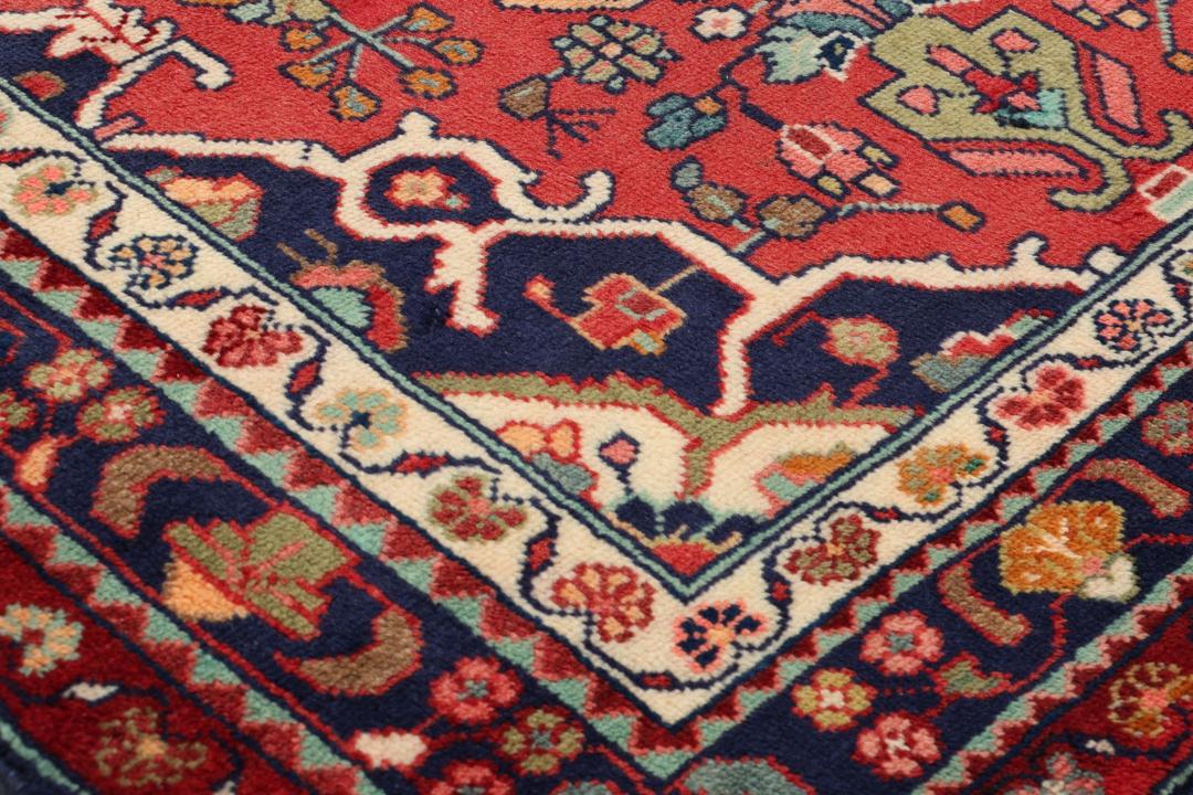 Hand-knotted red Hamadan runner with traditional floral motifs