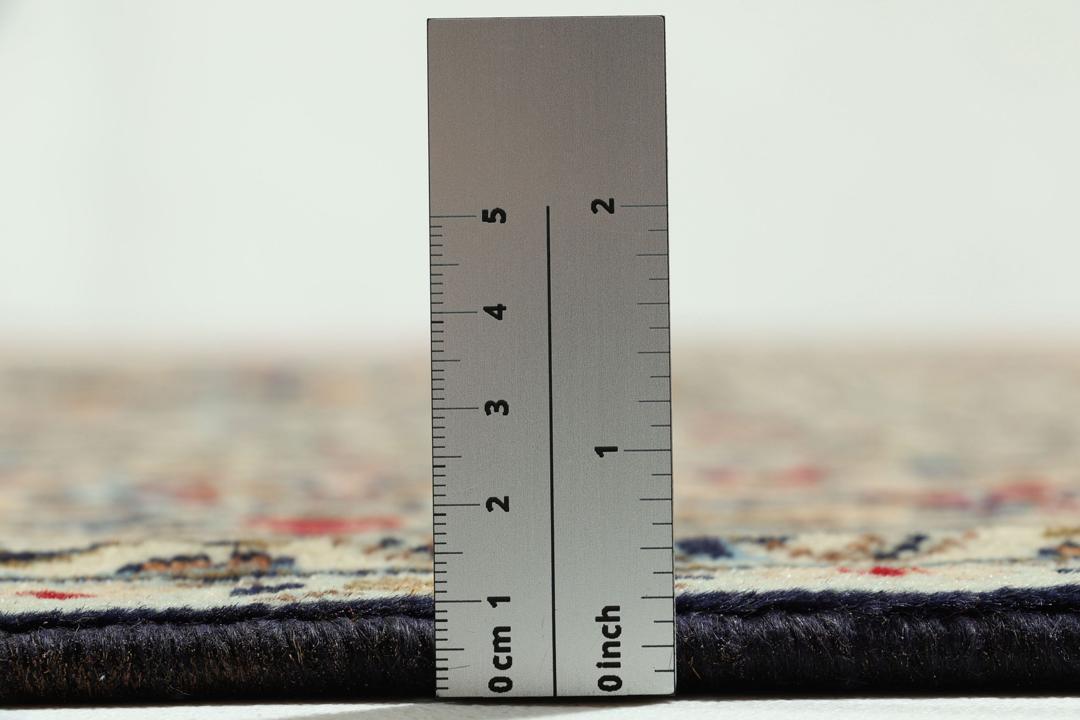 Hand-knotted Keshan rug from the Middle East in beige and blue tones