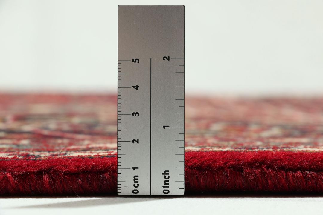 Håndknyttet Mashad-tæppe fra Mellemøsten i dyb rød
