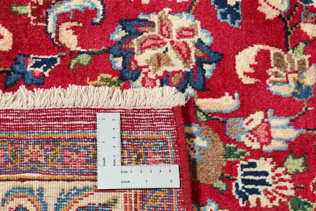 Håndknyttet Mashad-tæppe fra Mellemøsten i dybrød med blomstermotiver