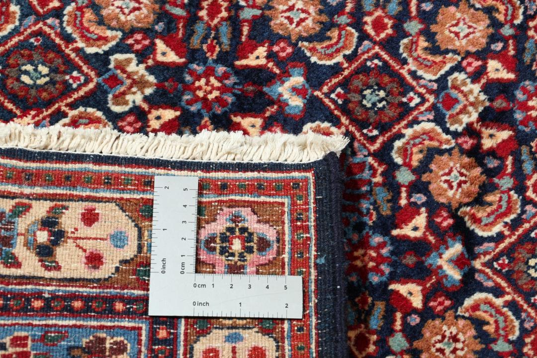 Handgeknoopt Moud-tapijt uit het Midden-Oosten in tinten blauw en rood