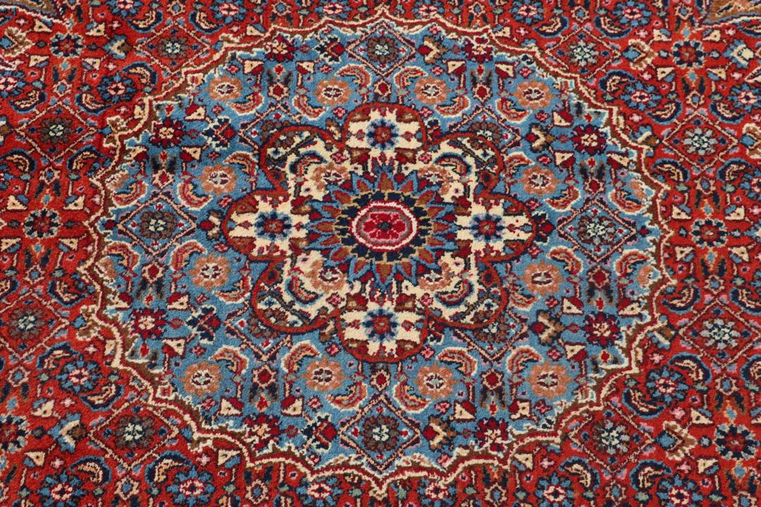 Handgeknoopt Moud-tapijt uit het Midden-Oosten in tinten blauw en rood