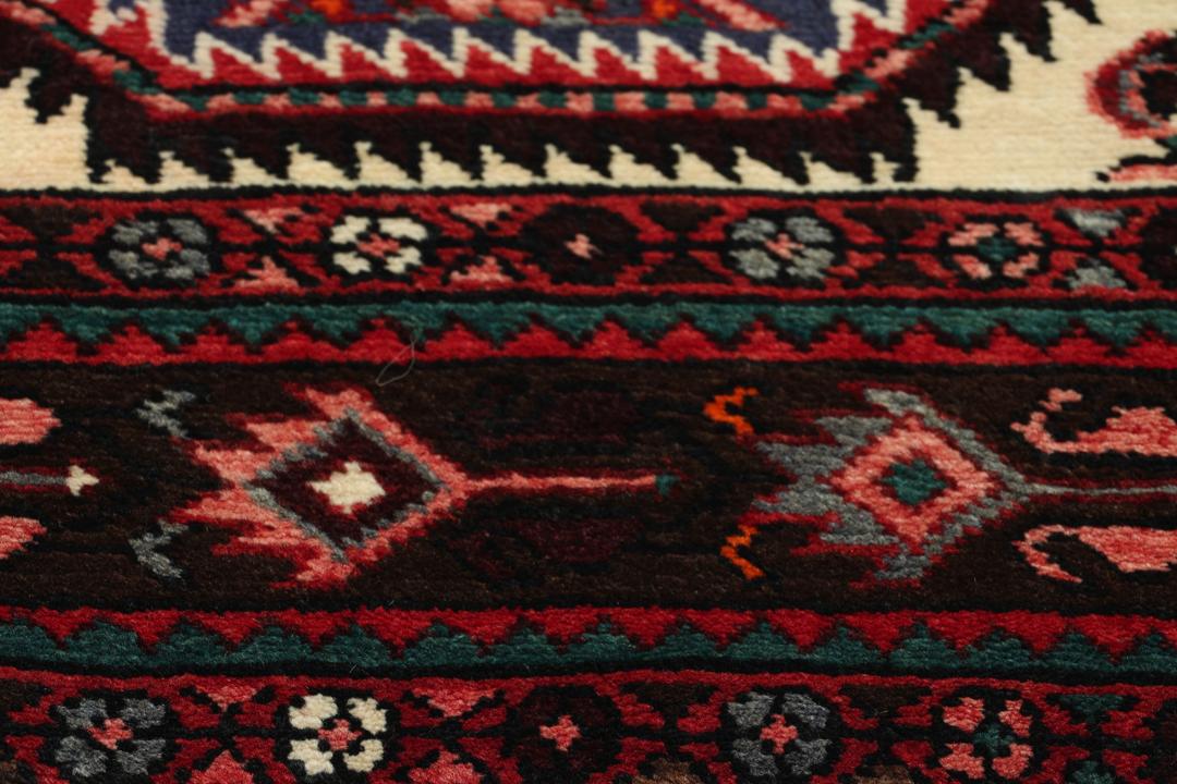 Håndknyttet Hosseinabad løber med blåt felt og traditionelle motiver