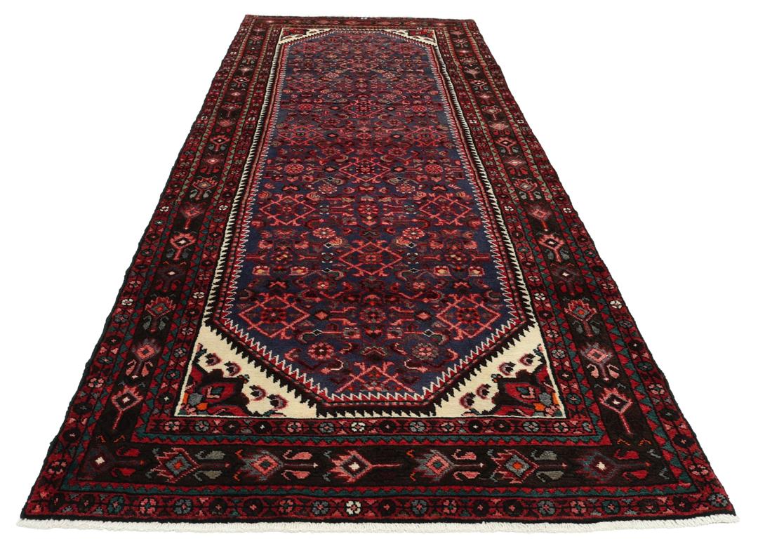 Håndknyttet Hosseinabad løber med blåt felt og traditionelle motiver