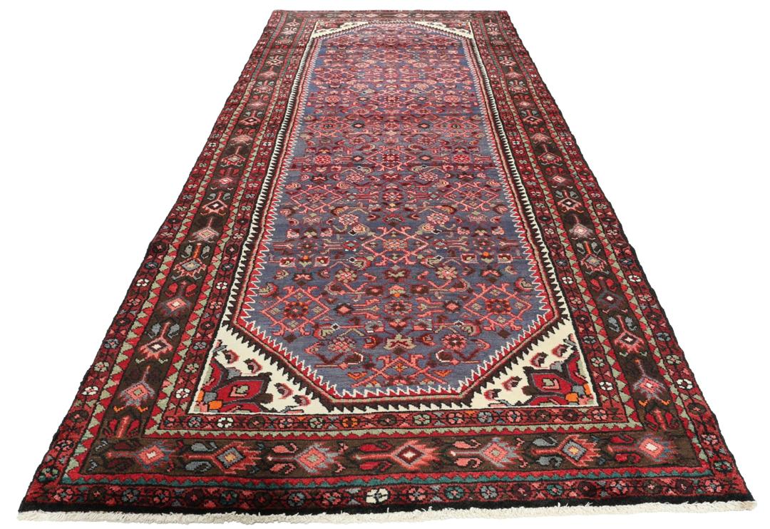 Håndknyttet Hosseinabad løber med blåt felt og traditionelle motiver