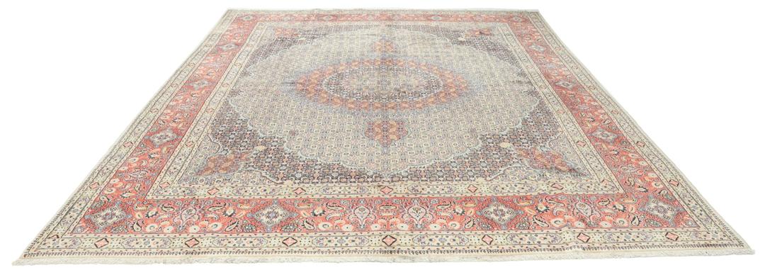 Hand-knotted Moud rug from the Middle East featuring a multicolor floral medallion design.