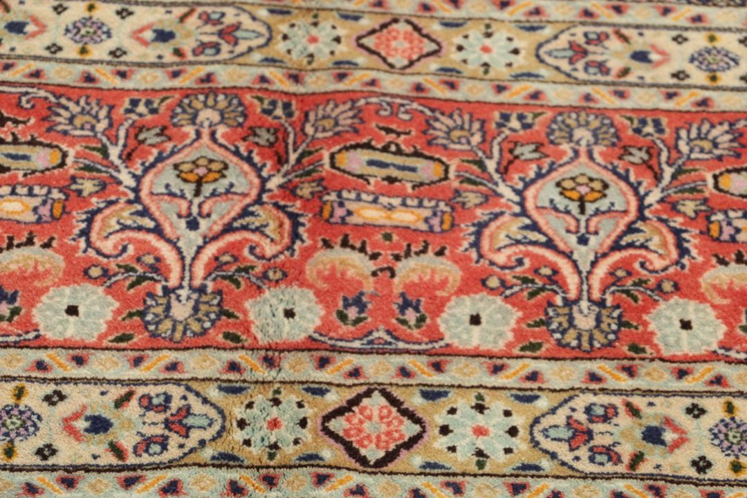 Hand-knotted Moud rug from the Middle East featuring a multicolor floral medallion design.